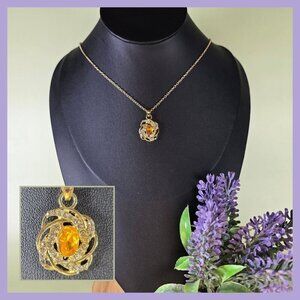 2/$20 Rhinestone Swirl Pendant‎ Necklace With Yellow Rhinestone Center (NWOT)